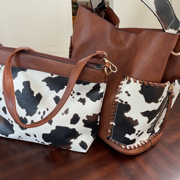 N/A Handbags - Women’s set of two brown cow print Foux leather cross body, large tote bag/ purs